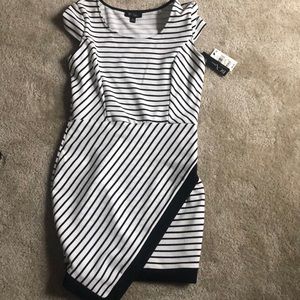 BCX striped dress, black and white, new with tags. Never worn. Stretchy.